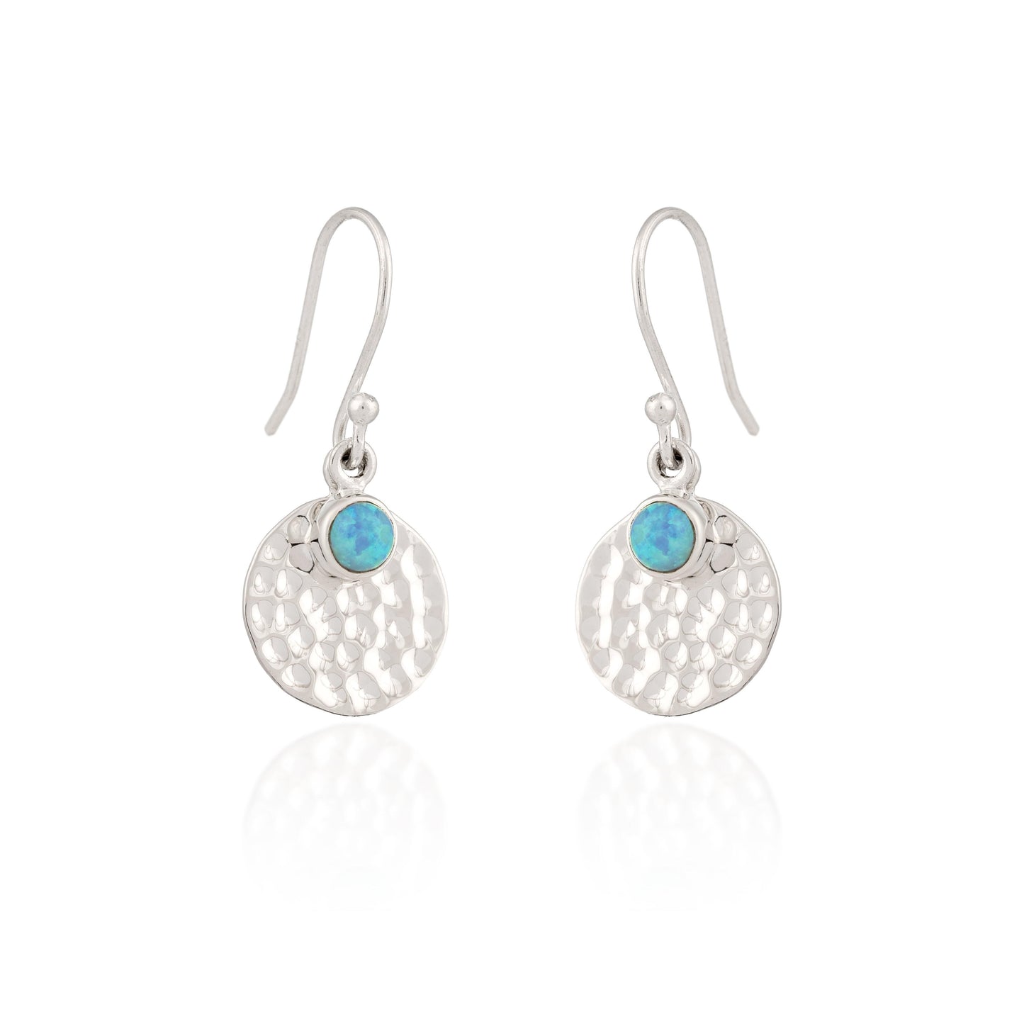 Silver earrings with turquoise stones on a white background