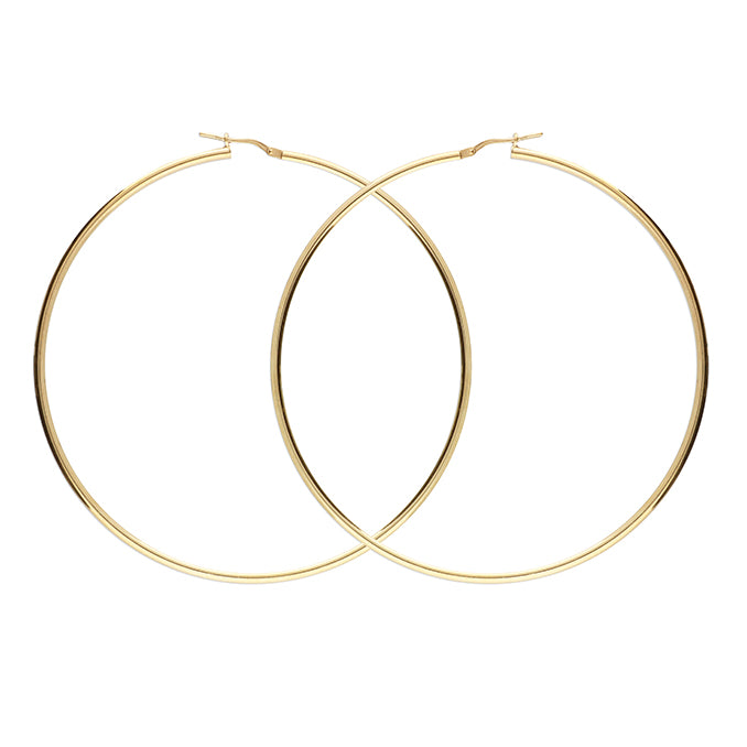 Gold hoop earrings on a white background