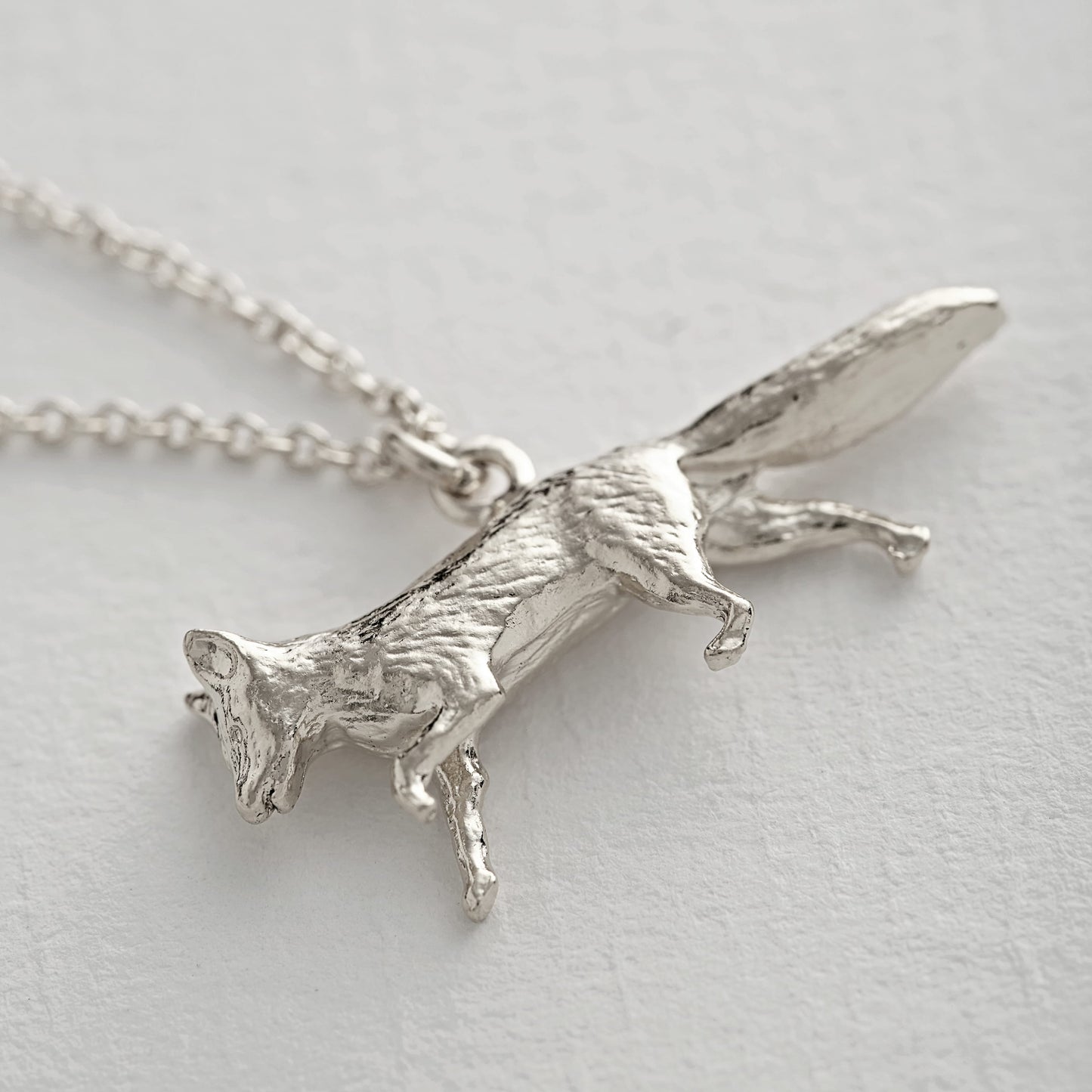 Close-up of a Alex Monroe Sterling Silver Prowling Fox Necklace