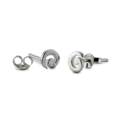 Pair of silver spiral earrings on a white background