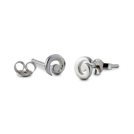 Pair of silver spiral earrings on a white background