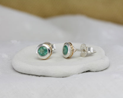 Sterling Silver Emerald Stud Earrings With 14 carat Gold Detail