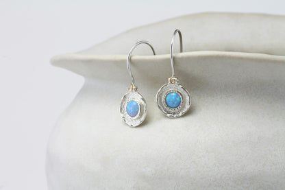 Sterling Silver Blue Opalite Hook Earrings on a white ceramic dish