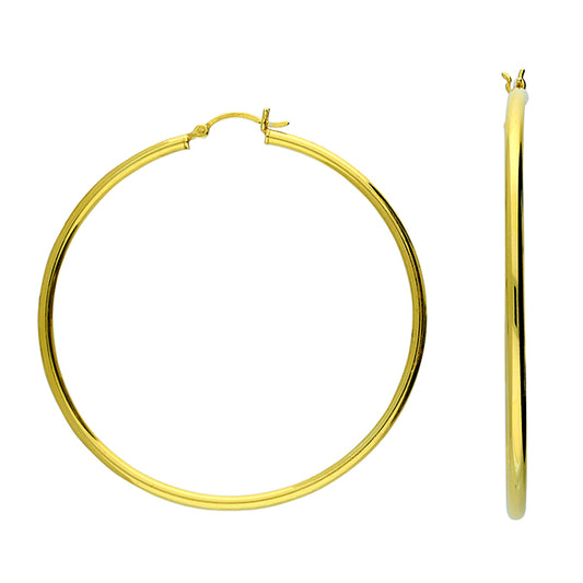 Gold hoop earrings on a white background