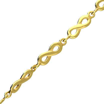 Gold bracelet with infinity link design on a white background